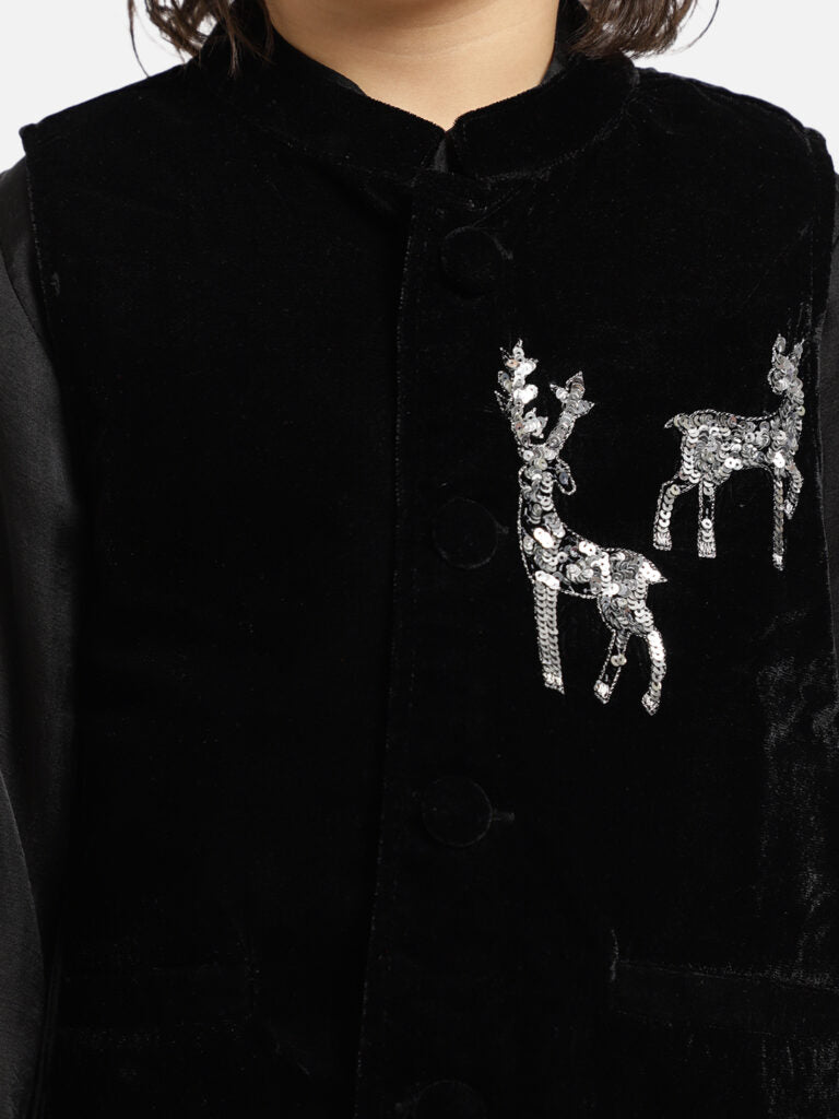 Black velvet kurta with animal motif embellishments