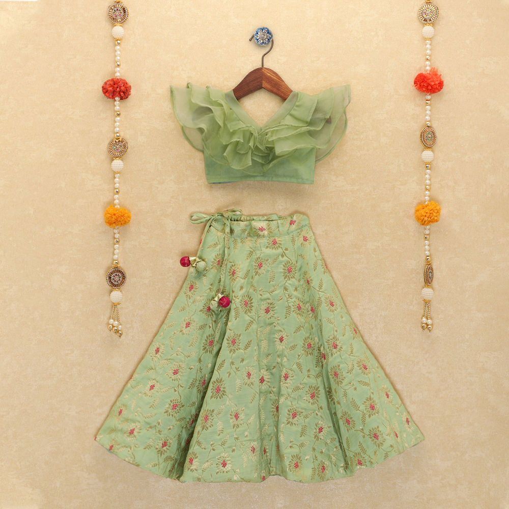 Girls Green Ruffled Blouse And Floral Lehenga Set